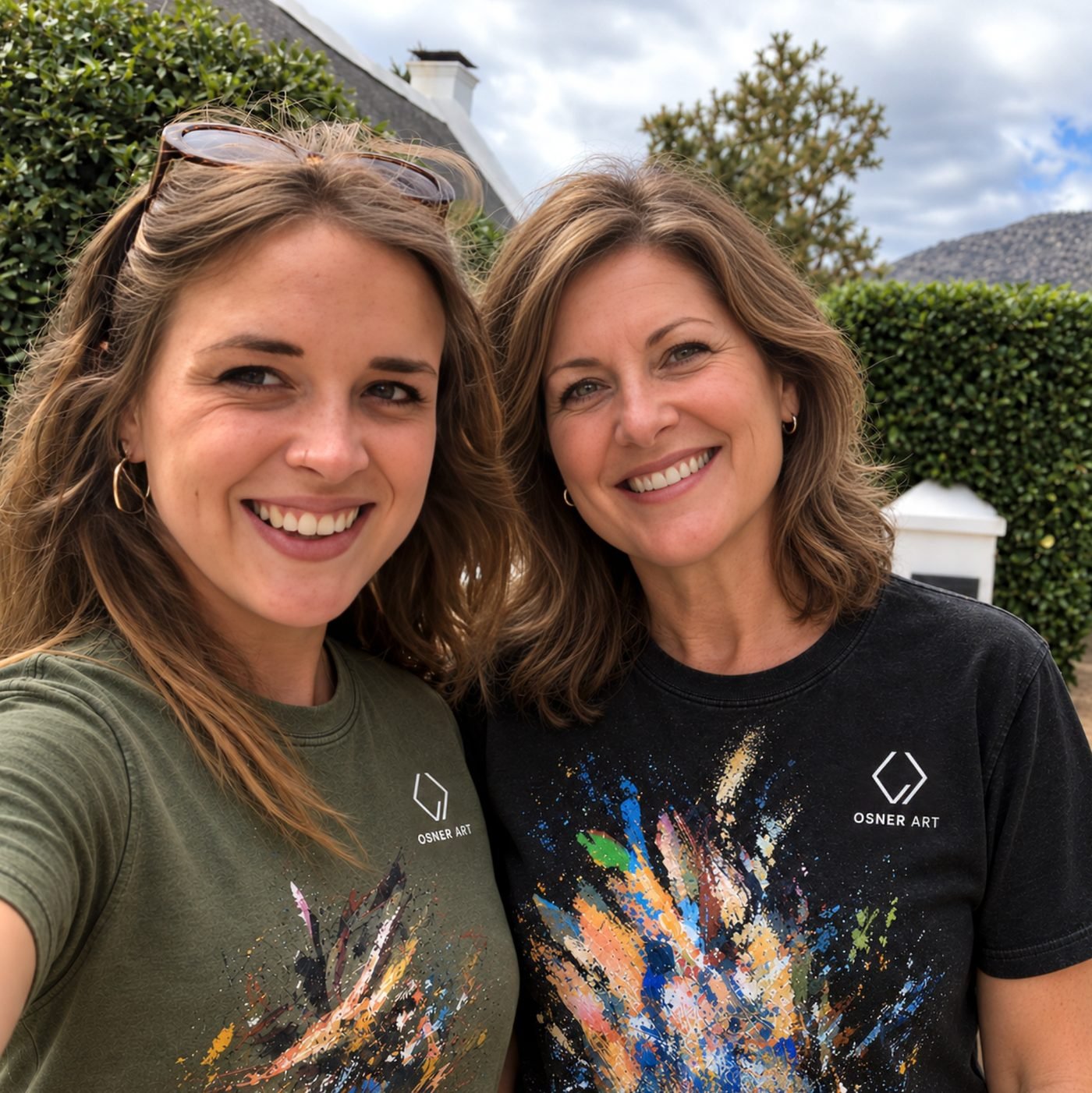 Samantha Lee Osner and a student, both in painted Osner Art T-shirts