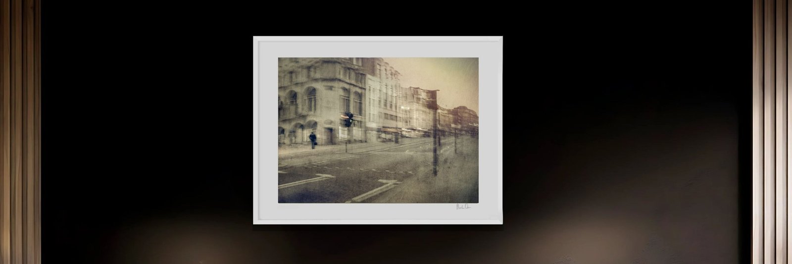 A framed urban street art photograph by Martin Osner on a dark wall
